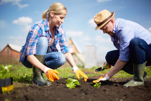 Operative performing remedial garden work